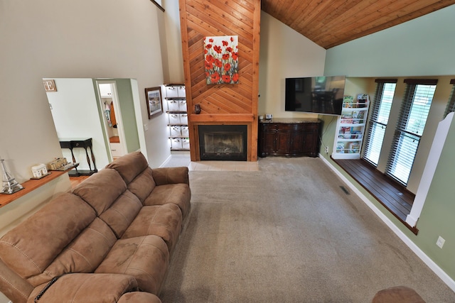 4359 Shire Cove Rd, Hilliard, OH 43026 - living room featuring high vaulted ceiling, a fireplace, baseboards, carpet, and wood ceiling