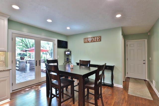 4359 Shire Cove Rd, Hilliard, OH 43026 - dining room featuring dark wood-style flooring, recessed lighting, french doors, baseboards, and a textured ceiling