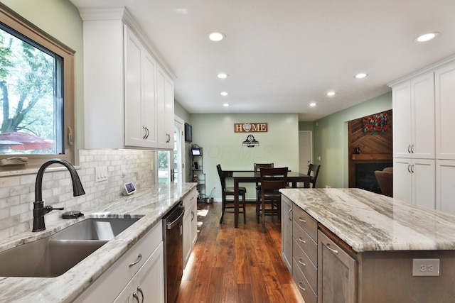 4359 Shire Cove Rd, Hilliard, OH 43026 - kitchen featuring a sink, recessed lighting, dishwasher, healthy amount of natural light, and tasteful backsplash