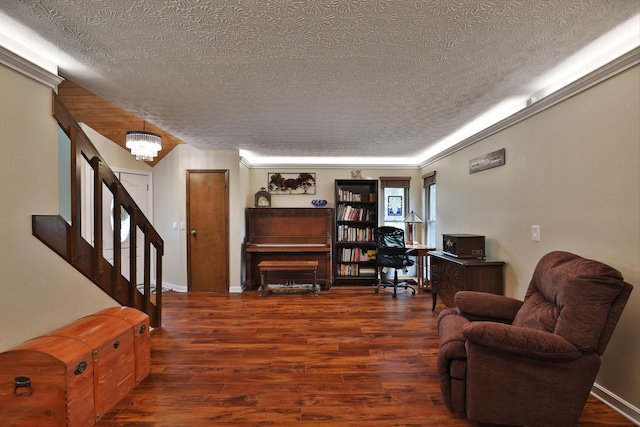 4359 Shire Cove Rd, Hilliard, OH 43026 - living room featuring a textured ceiling, wood finished floors, a chandelier, and stairway