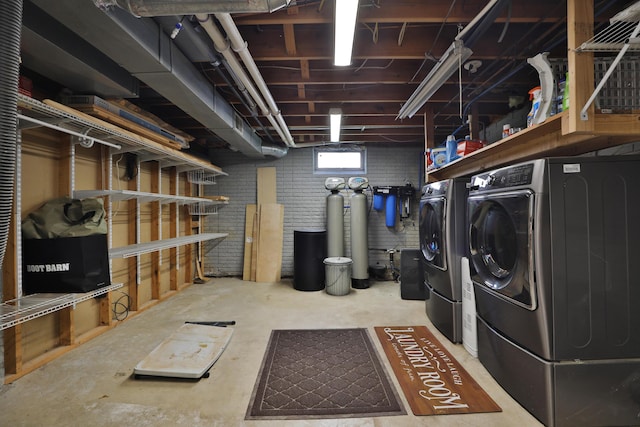 4359 Shire Cove Rd, Hilliard, OH 43026 - below grade area featuring a water softener system and washer and dryer