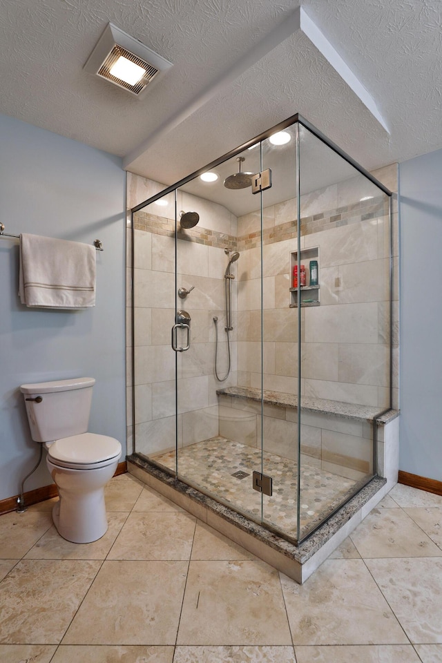 4359 Shire Cove Rd, Hilliard, OH 43026 - full bath with a shower stall, a textured ceiling, and tile patterned floors