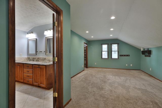4359 Shire Cove Rd, Hilliard, OH 43026 - additional living space featuring lofted ceiling, recessed lighting, a textured ceiling, and light carpet
