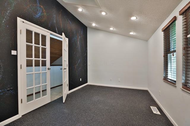 4359 Shire Cove Rd, Hilliard, OH 43026 - empty room featuring carpet, a textured ceiling, french doors, and recessed lighting