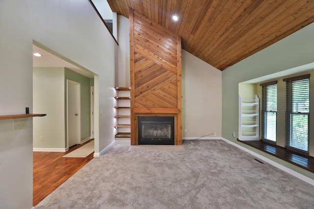 4359 Shire Cove Rd, Hilliard, OH 43026 - unfurnished living room featuring high vaulted ceiling, carpet flooring, wooden ceiling, a large fireplace, and recessed lighting