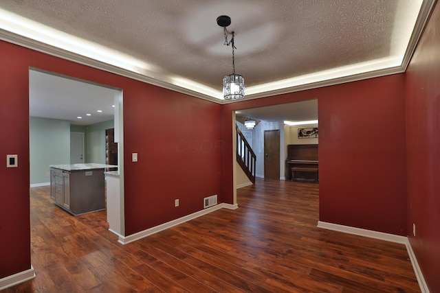 4359 Shire Cove Rd, Hilliard, OH 43026 - unfurnished dining area featuring a textured ceiling, dark wood-style floors, stairs, and recessed lighting