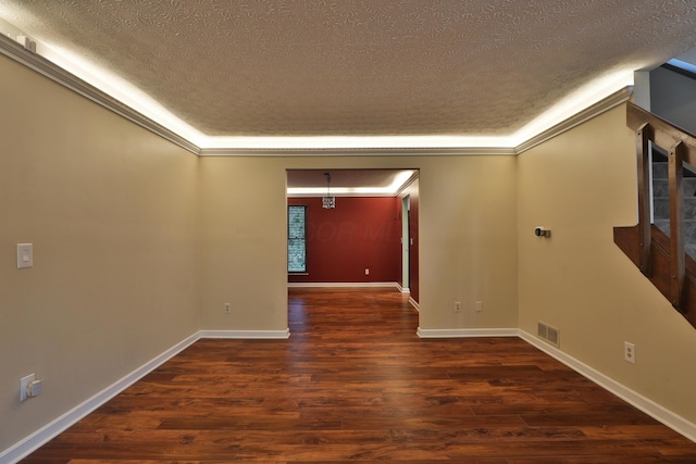 4359 Shire Cove Rd, Hilliard, OH 43026 - empty room featuring a textured ceiling, wood finished floors, and crown molding