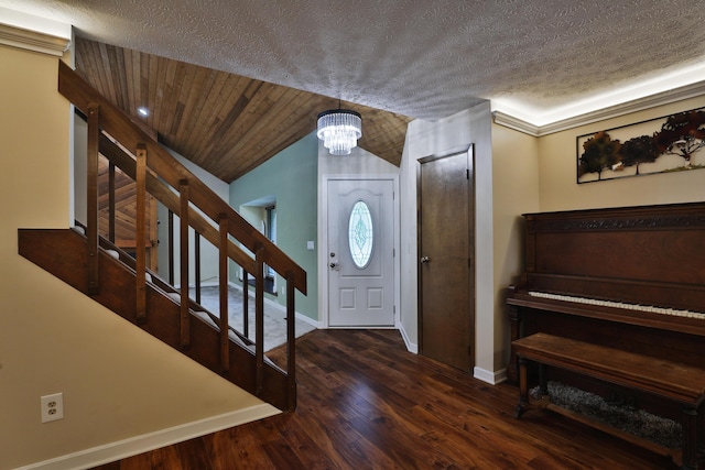 4359 Shire Cove Rd, Hilliard, OH 43026 - entryway with stairway, a chandelier, wood finished floors, vaulted ceiling, and a textured ceiling