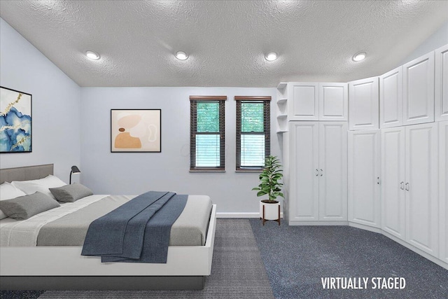 4359 Shire Cove Rd, Hilliard, OH 43026 - bedroom with a textured ceiling, dark colored carpet, and recessed lighting