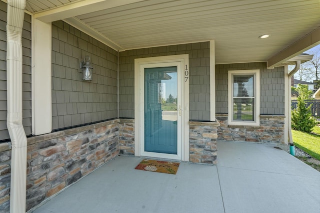 107 Willows End, Bellefontaine, OH 43311 - doorway to property with stone siding