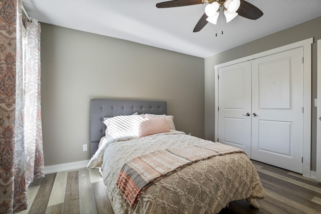 107 Willows End, Bellefontaine, OH 43311 - bedroom featuring wood finished floors, a closet, ceiling fan, and baseboards