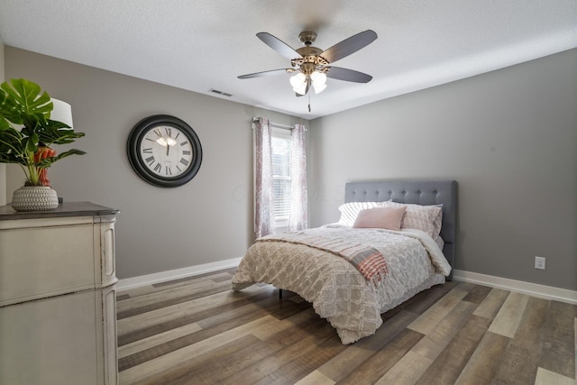 107 Willows End, Bellefontaine, OH 43311 - bedroom featuring wood finished floors, baseboards, and ceiling fan