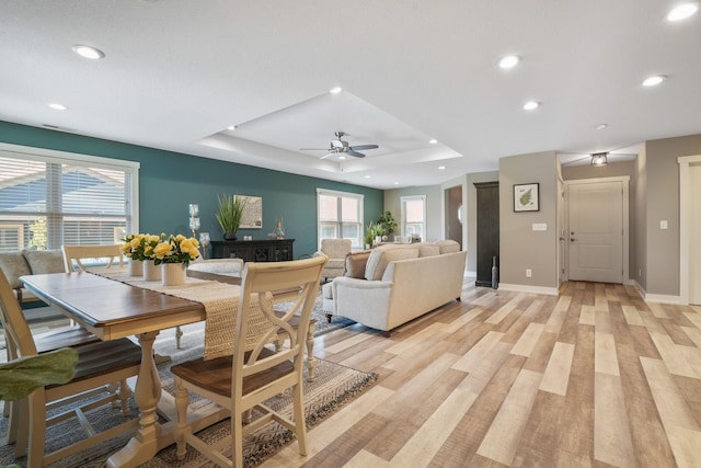 107 Willows End, Bellefontaine, OH 43311 - dining space featuring a raised ceiling, ceiling fan, recessed lighting, healthy amount of natural light, and baseboards