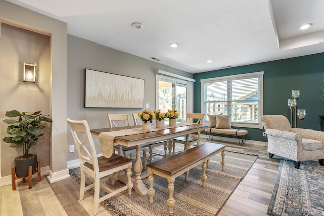 107 Willows End, Bellefontaine, OH 43311 - dining area featuring baseboards, light wood-style floors, and recessed lighting
