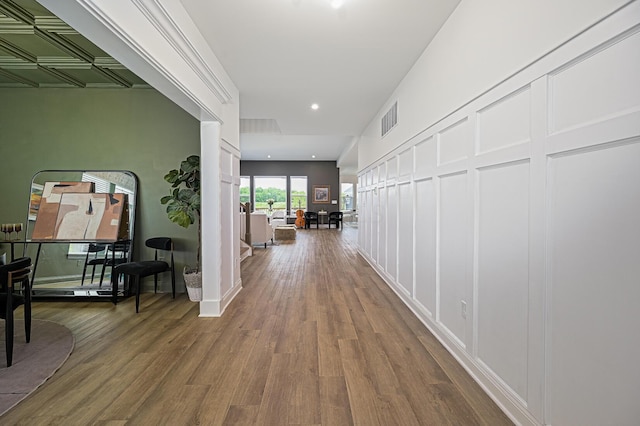 2733 Sycamore Trce, Hilliard, OH 43026 - corridor featuring a decorative wall, wood finished floors, and recessed lighting