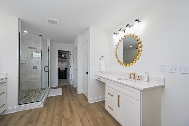 2733 Sycamore Trce, Hilliard, OH 43026 - full bath featuring vanity, wood finished floors, a shower stall, and baseboards