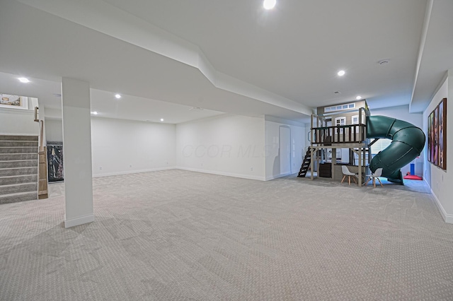 2733 Sycamore Trce, Hilliard, OH 43026 - finished below grade area featuring light carpet, stairs, baseboards, and recessed lighting