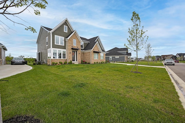 2733 Sycamore Trce, Hilliard, OH 43026 - traditional-style house featuring brick siding and a front lawn