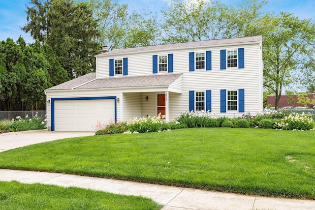 1609 Slade Ave, Columbus, OH 43235 - view of front of house with driveway, a chimney, and roof with shingles