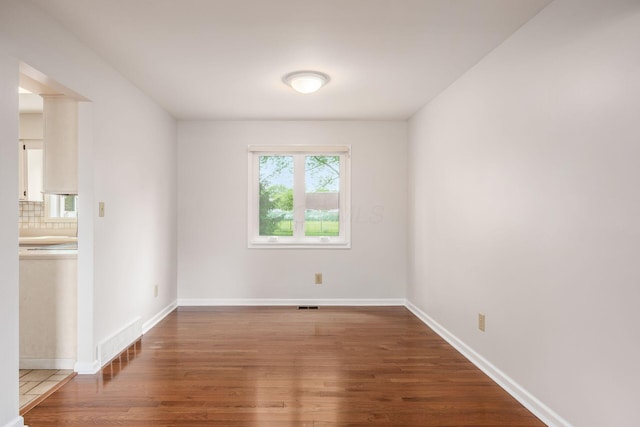 1609 Slade Ave, Columbus, OH 43235 - spare room with wood finished floors and baseboards