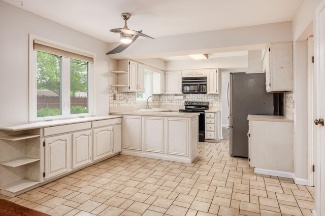 1609 Slade Ave, Columbus, OH 43235 - kitchen featuring black appliances, open shelves, backsplash, a ceiling fan, and light countertops