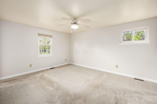 1609 Slade Ave, Columbus, OH 43235 - unfurnished room with baseboards, a ceiling fan, and carpet floors