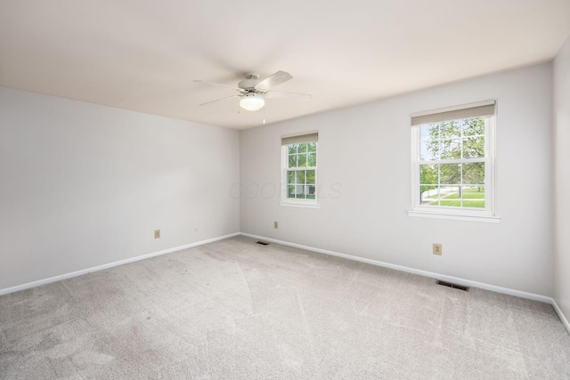 1609 Slade Ave, Columbus, OH 43235 - spare room with ceiling fan, baseboards, and carpet flooring