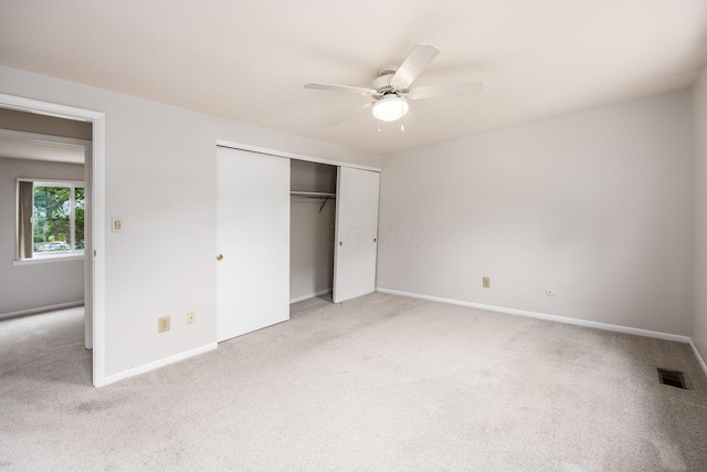 1609 Slade Ave, Columbus, OH 43235 - unfurnished bedroom featuring carpet, a closet, baseboards, and ceiling fan