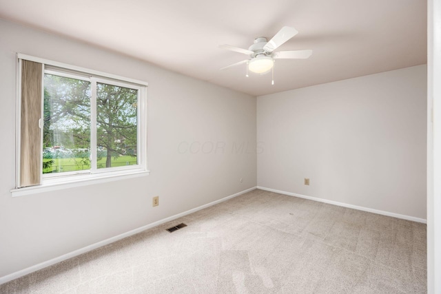 1609 Slade Ave, Columbus, OH 43235 - carpeted empty room with baseboards and ceiling fan