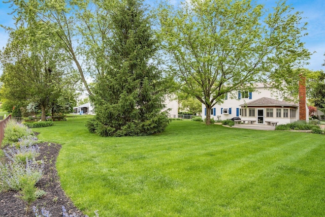 1609 Slade Ave, Columbus, OH 43235 - view of green lawn featuring a patio