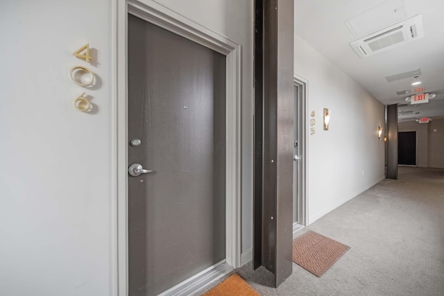825 N 4th St Unit 406, Columbus, OH 43215 - hallway with carpet flooring and baseboards