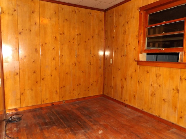 938 Meadowview Ave, Lancaster, OH 43130 - empty room with hardwood / wood-style flooring and wood walls