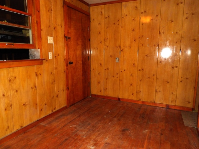 938 Meadowview Ave, Lancaster, OH 43130 - unfurnished room featuring hardwood / wood-style flooring and wood walls