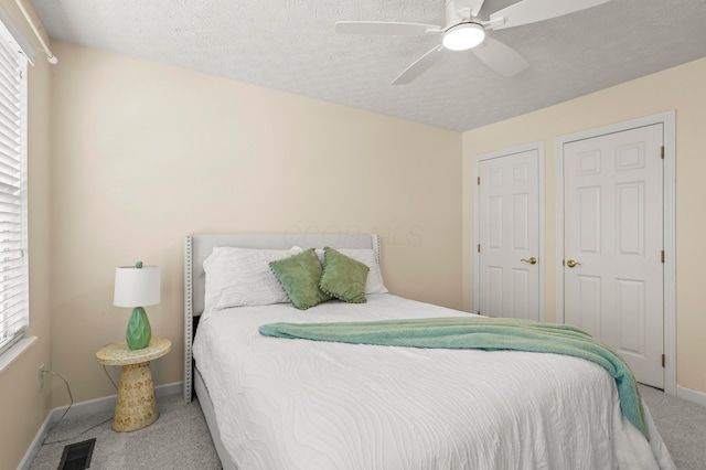 6702 Golden Way, Powell, OH 43065 - carpeted bedroom featuring baseboards, ceiling fan, and a textured ceiling