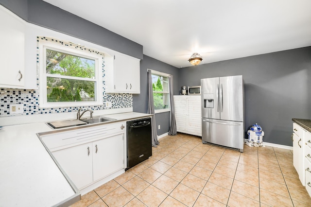 2175 Ridgeview Rd, Upper Arlington, OH 43221 - kitchen featuring stainless steel appliances, tasteful backsplash, baseboards, and a sink
