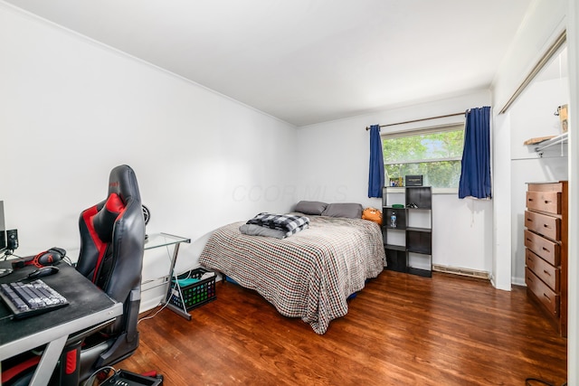 2175 Ridgeview Rd, Upper Arlington, OH 43221 - bedroom with wood finished floors, an office area, ornamental molding, and baseboards