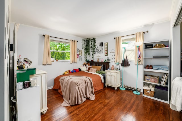 2175 Ridgeview Rd, Upper Arlington, OH 43221 - bedroom featuring dark wood-style flooring and ornamental molding