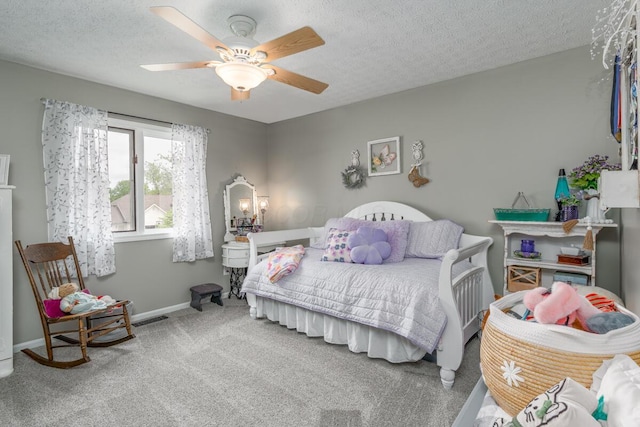 4561 Bent Creek Pl, Grove City, OH 43123 - carpeted bedroom featuring baseboards, ceiling fan, and a textured ceiling