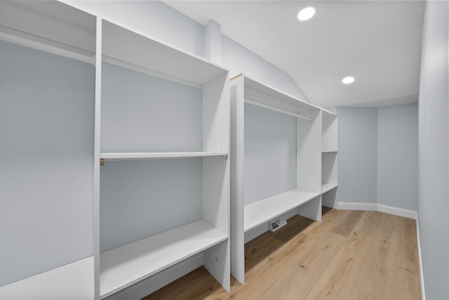 2583 Wexford Rd, Columbus, OH 43221 - mudroom with wood finished floors, recessed lighting, vaulted ceiling, and baseboards