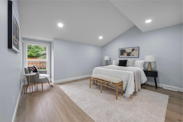 2583 Wexford Rd, Columbus, OH 43221 - bedroom featuring wood finished floors, baseboards, lofted ceiling, and recessed lighting