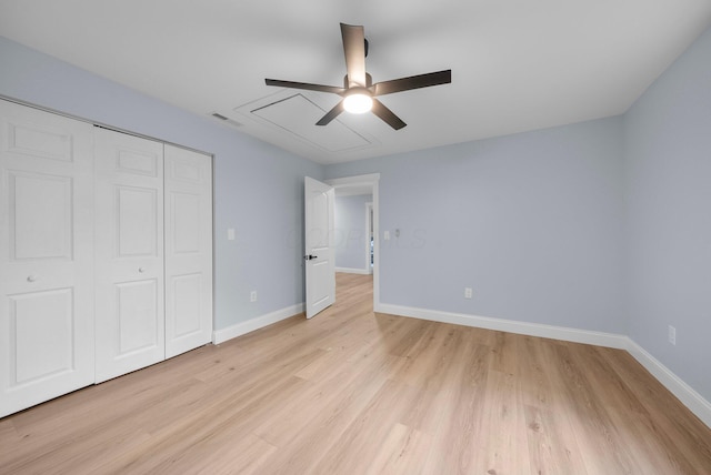 2583 Wexford Rd, Columbus, OH 43221 - unfurnished bedroom with light wood-style flooring, a closet, baseboards, and a ceiling fan