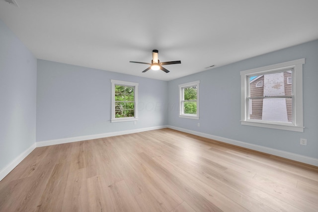 2583 Wexford Rd, Columbus, OH 43221 - unfurnished room featuring light wood-style flooring, a ceiling fan, and baseboards