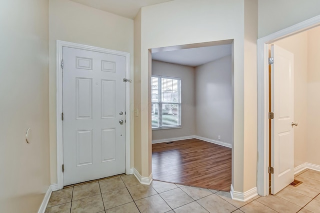 2697 Rinaldi Dr, Columbus, OH 43219 - foyer with light tile patterned floors and baseboards