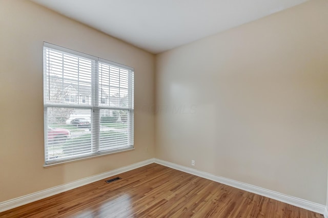 2697 Rinaldi Dr, Columbus, OH 43219 - unfurnished room with plenty of natural light, light wood-type flooring, and baseboards