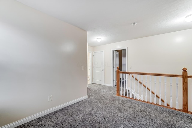 2697 Rinaldi Dr, Columbus, OH 43219 - spare room featuring carpet flooring, baseboards, and a smoke detector