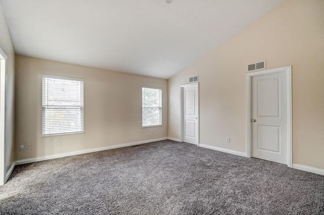 2697 Rinaldi Dr, Columbus, OH 43219 - unfurnished bedroom featuring carpet floors, baseboards, and high vaulted ceiling