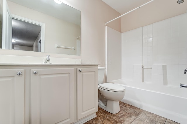 2697 Rinaldi Dr, Columbus, OH 43219 - bathroom featuring toilet, vanity, shower / washtub combination, and tile patterned flooring