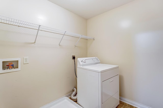 2697 Rinaldi Dr, Columbus, OH 43219 - washroom with washer / clothes dryer and baseboards