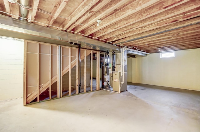 2697 Rinaldi Dr, Columbus, OH 43219 - below grade area featuring heating unit and water heater
