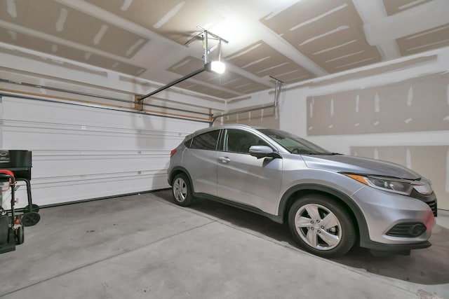 5384 Coble Meadows Ln, Canal Winchester, OH 43110 - garage featuring a garage door opener